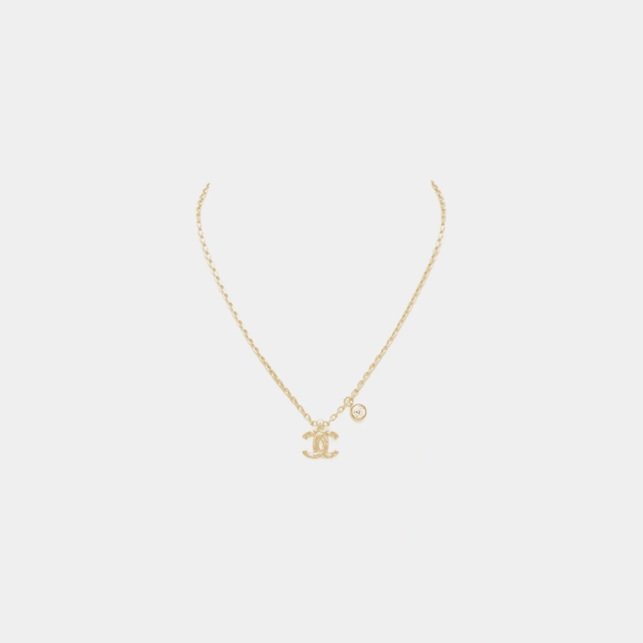 Gold Metal CC Pendant Necklace with Crystal Accent